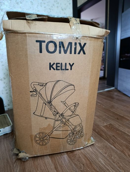 Продам новую коляску в упаковке Tomix Kelly!