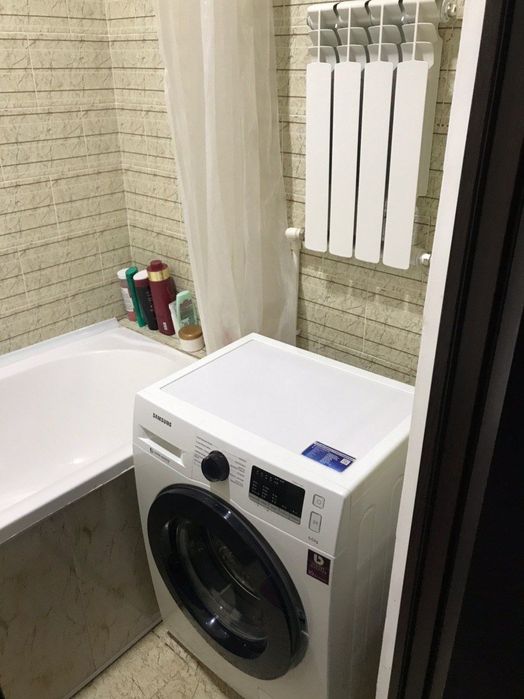 Санат саройи олдида Янги курилган Дом