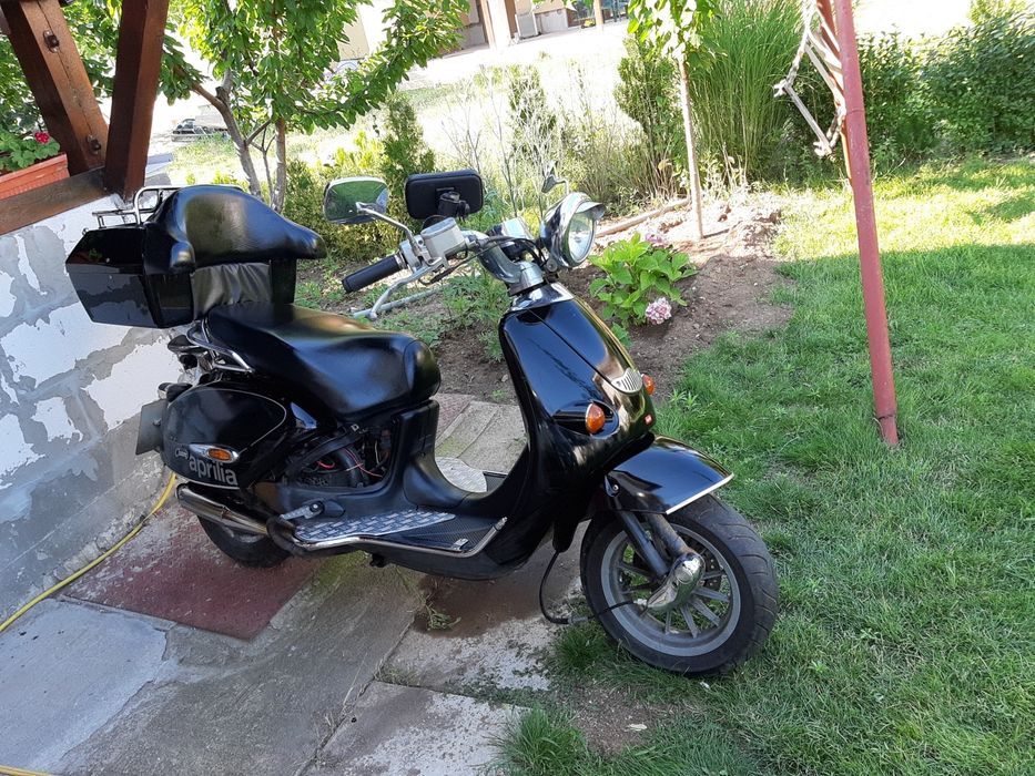 Скутер Априля 125 кубика