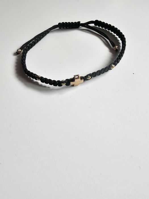 Мъжка гривна с конец и 14 карата златен елемент кръст .