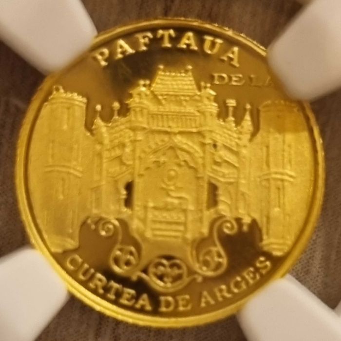 Moneda istoria aurului BNR Paftaua Curtea de Arges gradata NGC PF 70