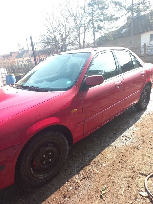 Мазда 323 90 к.с