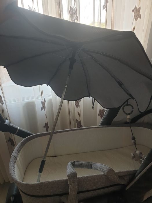 Vând Căruț 2 in1 conține landou, umbrela si geanta.. scaun de masa..