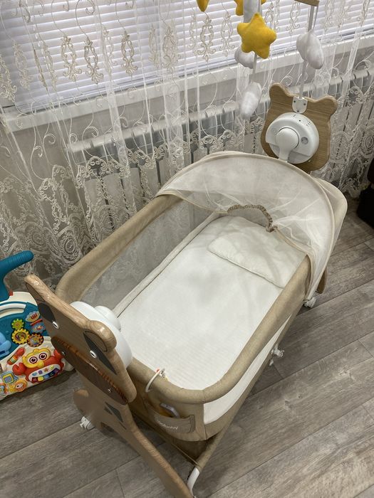 Детская кроватка качалка