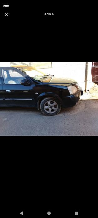 KIA karens 2 l automată