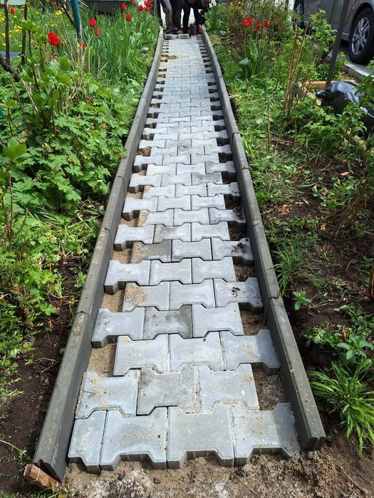 Полагане на тротоарни плочки и паважи