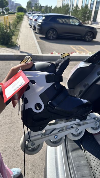 Роликовые коньки