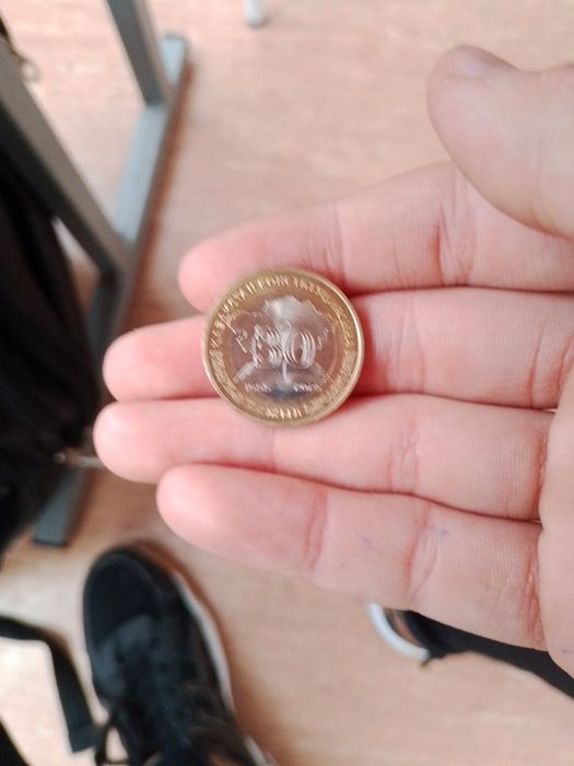 Монета 100тг продаю