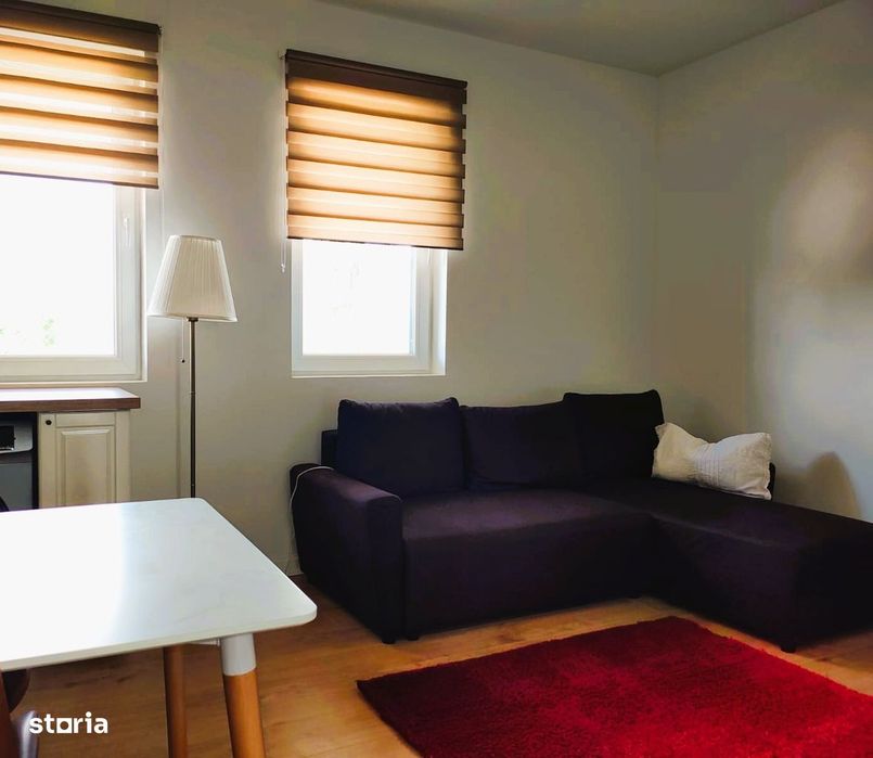 Apartament de închiriat cu grădină, parcare și facilități moderne