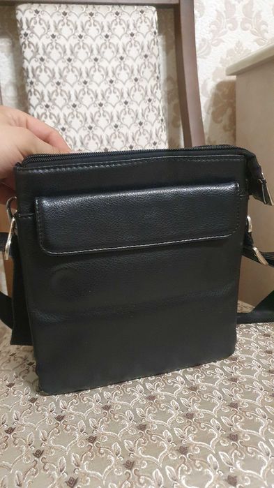 Барсетка черного цвета