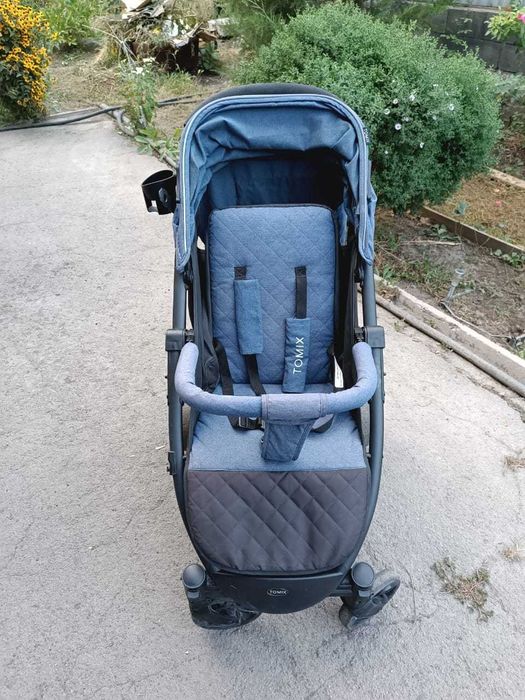 Продам прогулочную коляску TOMIX, б/у