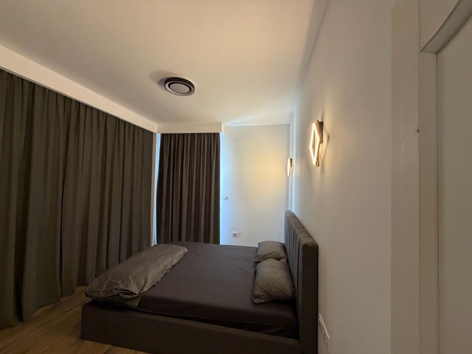 Inchiriez apartament  cu parcare subterana
