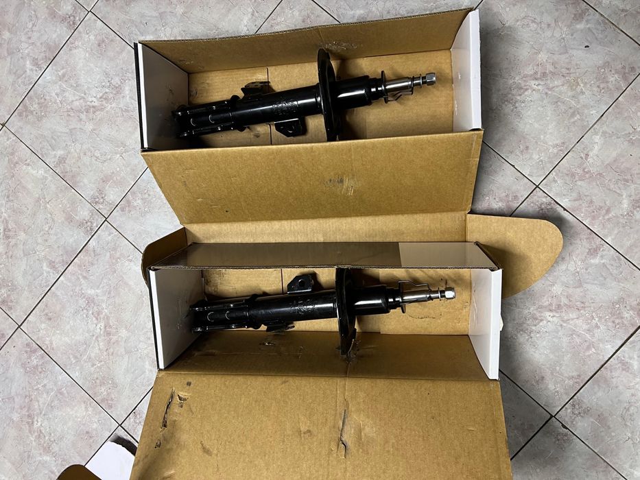 Передний аморт новый