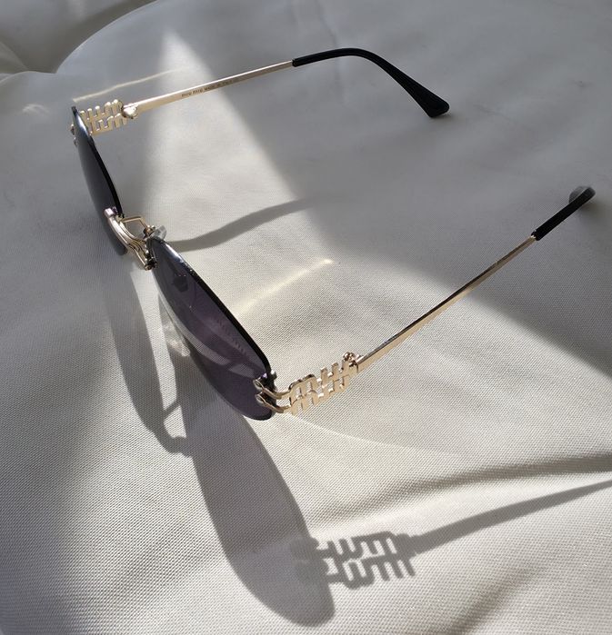 Дамски слънчеви очила  MIU MIU