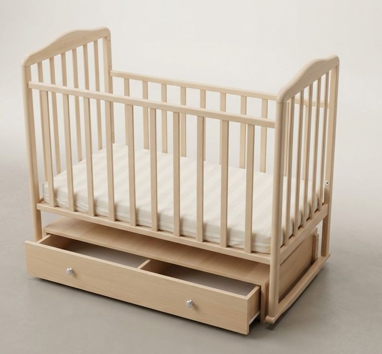 Детская кроватка с выдвижным  ящиком