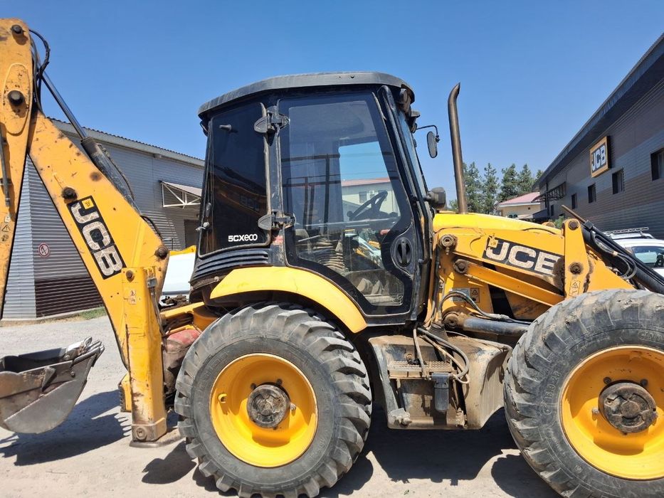 JCB 5cx Sotiladi holati yaxshi yili 2014