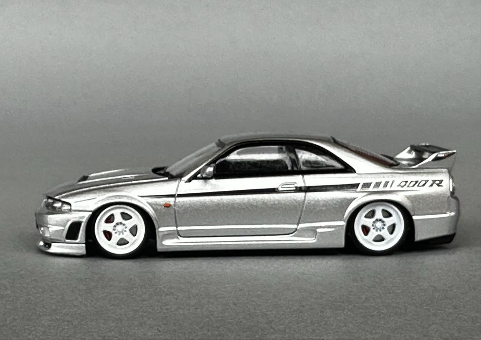 Macheta 1:64 Nissan R33 Nismo GTR ( nu tarmac hot wheels )