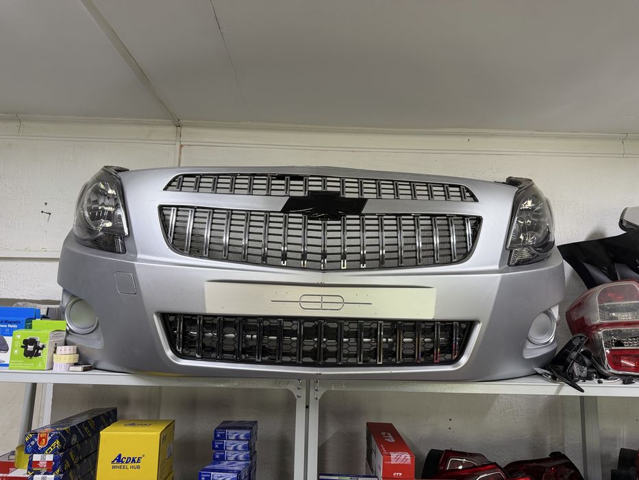 Оригинал задний бампер кобальт, равон р3