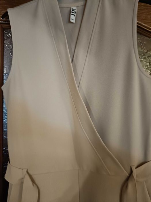 Vând salopeta eleganta