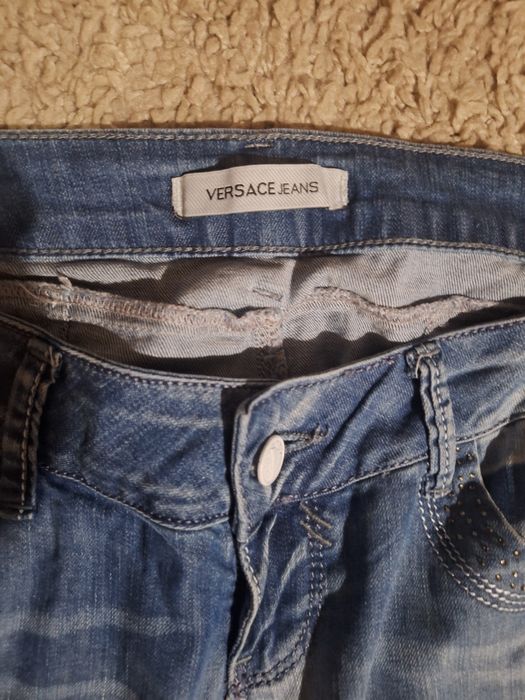 Vand blugi originali Versace