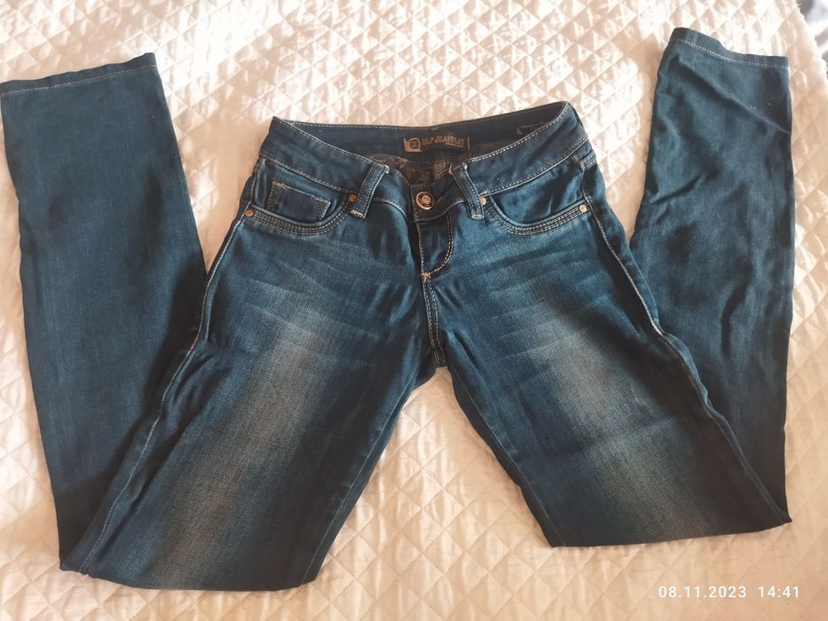 Джинсы для девочки 12 -13 лет