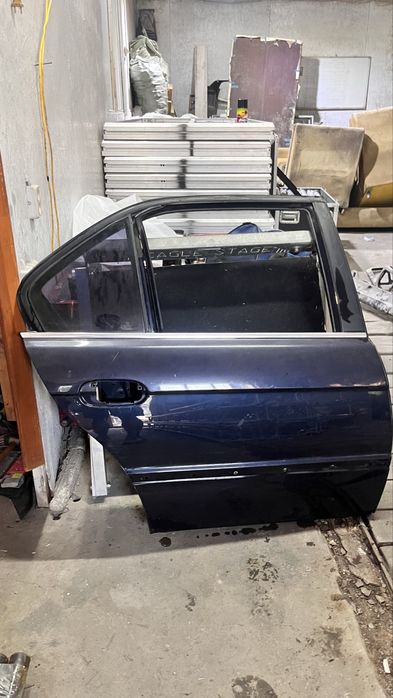 Дверь правая bmw e 38