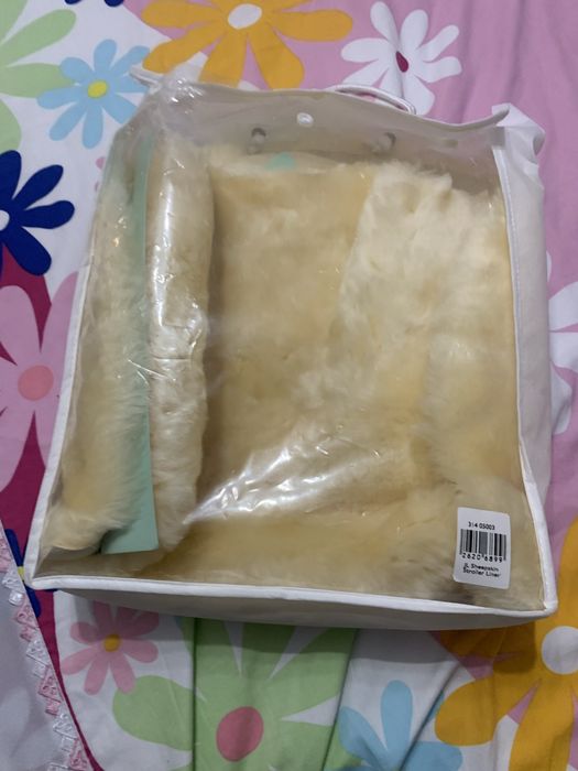 Подложка за количка от агнешка кожа