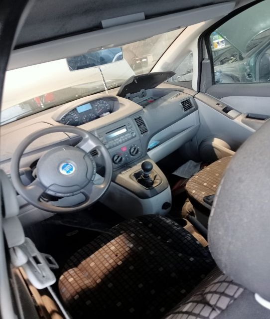 Ansamblu stergatoare parbriz volan pe stanga Fiat Idea prima generati