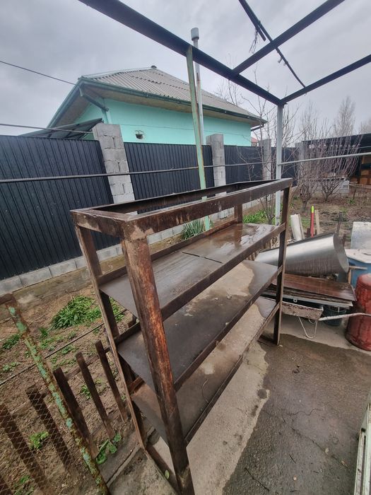 Темір полка гаражға