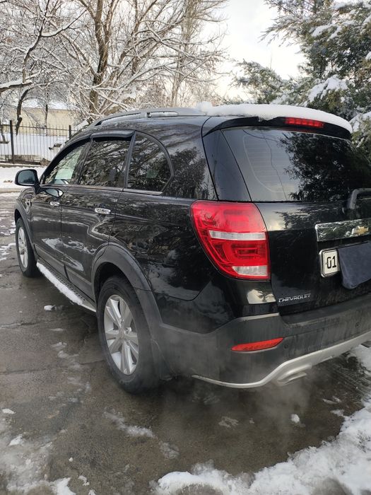 Captiva 2015 Y kraskasi toza xatto banferlayam toza benzinda avtomat .