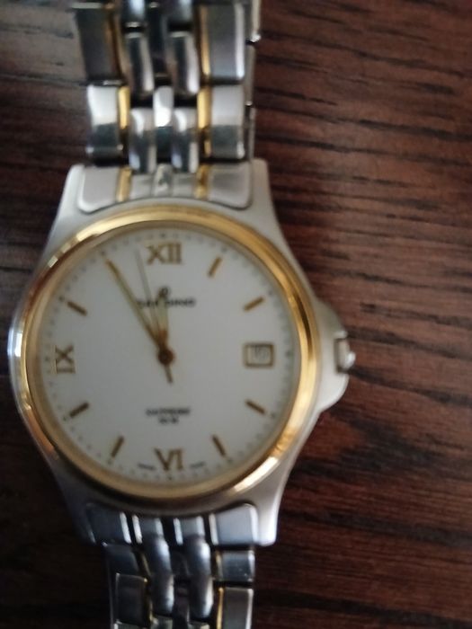 Ceas elvetian Candino Sapphire 50 M model 2086 
bratara metalica.
Ceas
