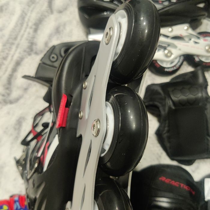 Коньки роликовые