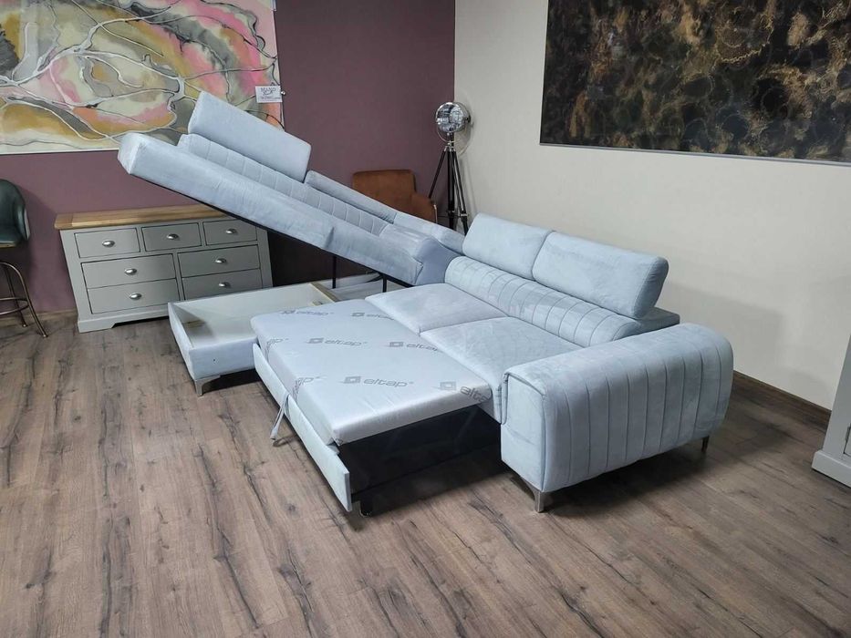 ПРОМОЦИЯ! Светло син ъглов диван от плат с функция сън и ракла