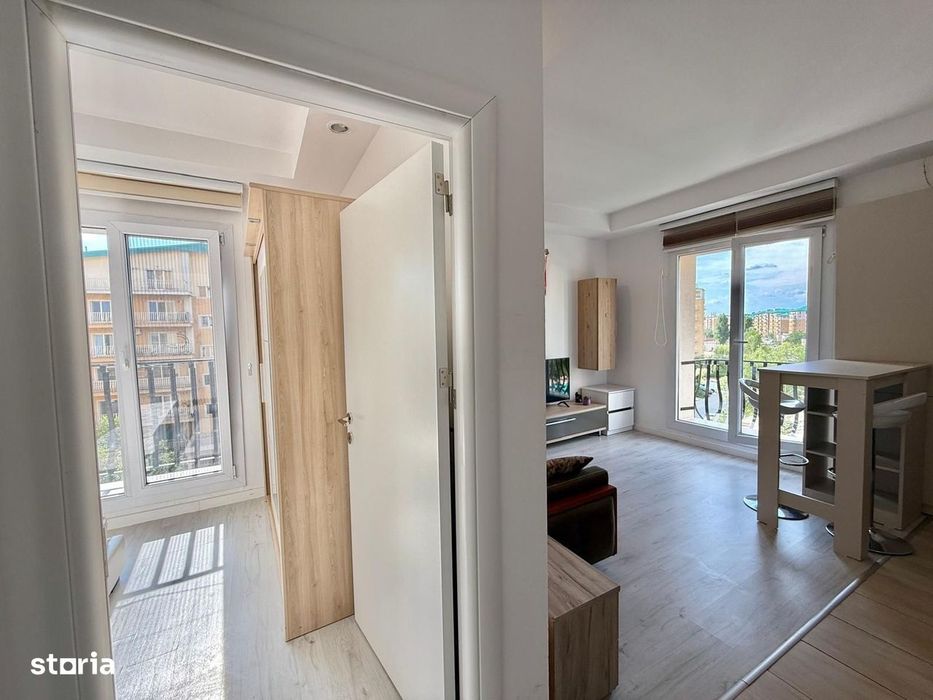 COSMOPOLIS - Apartament cu 2 camere tip studio, mobilat si utilat.