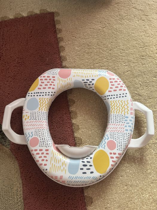 Отдам детское сиденье, аспиратор и пакеты для горшка