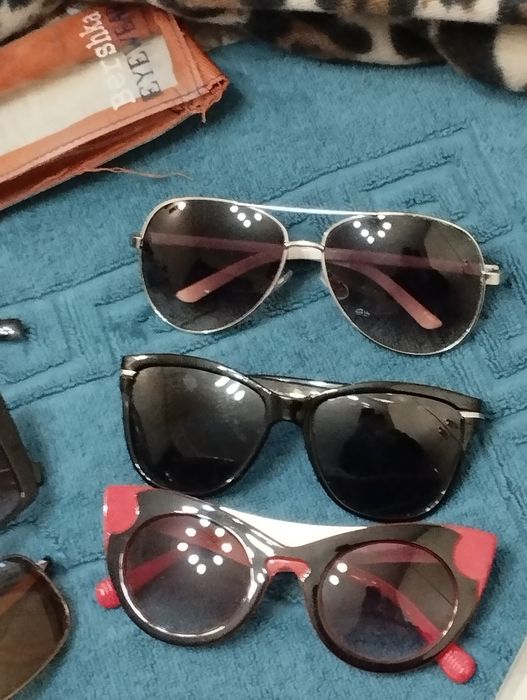 Солнцезащитные очки брендовые