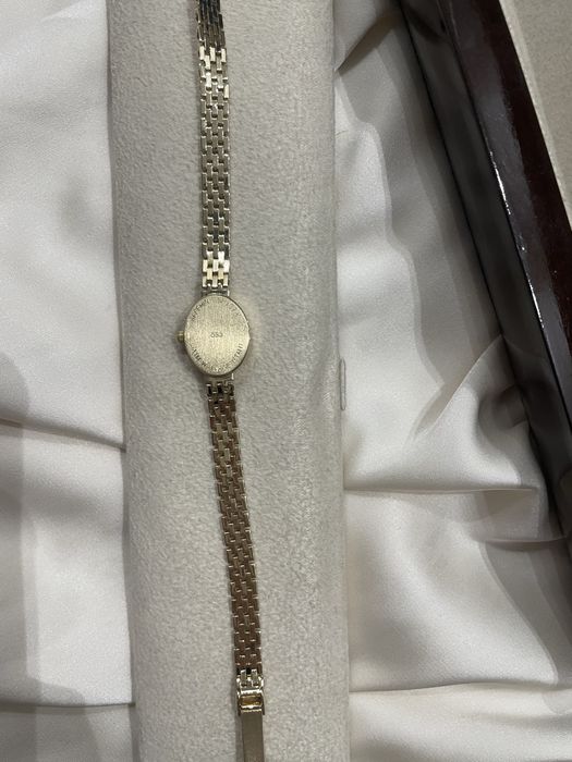 Золотые часы женские