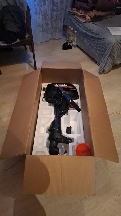 Мотор новый 4 лс . В упаковке