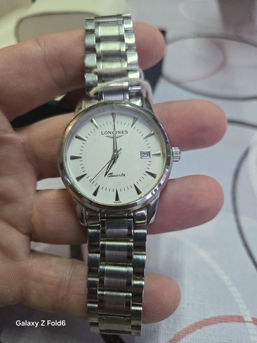 Longines quartz нов