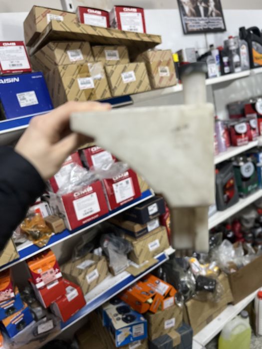 Бочок антифриза Nissan Tiida