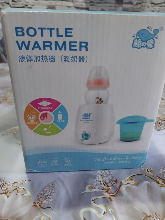 Детский подогреватель бутылочек.