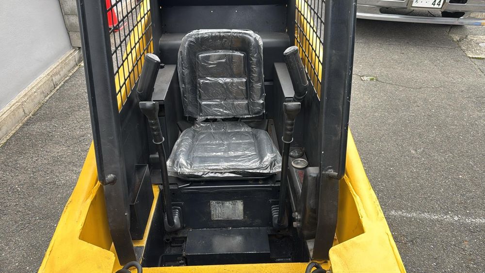 TCM Bobcat 604 погрузчик