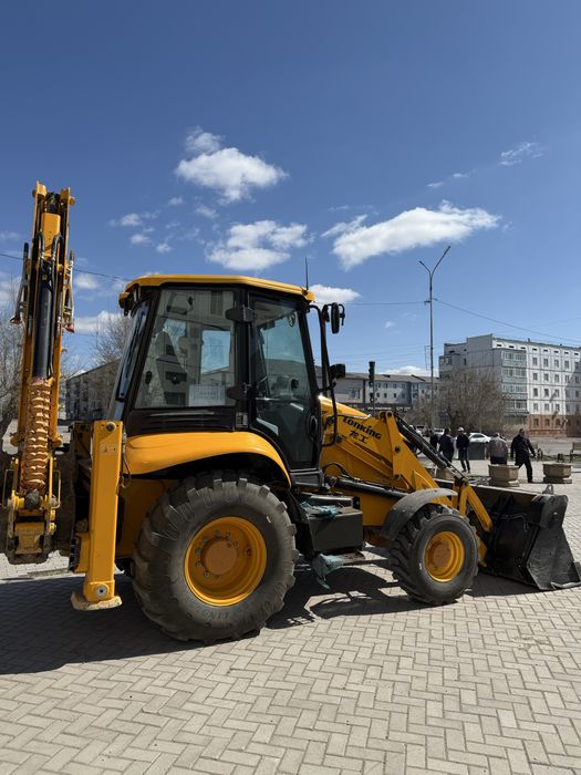 Экскаватор погрузчик3в1