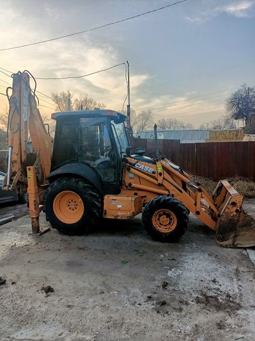 Case 580 эксковатор погрузчик