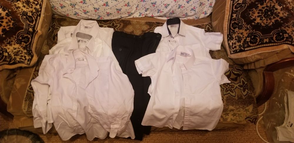 Продам школьный рубашки и штаны. Одна рубашка 3000 а штаны 5000