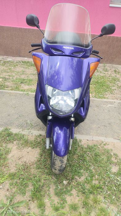 Motocicleta de teren și scuter
