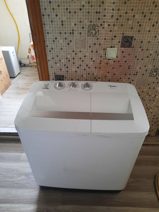 Полуавтомат стиралка новый каропке стоит дома