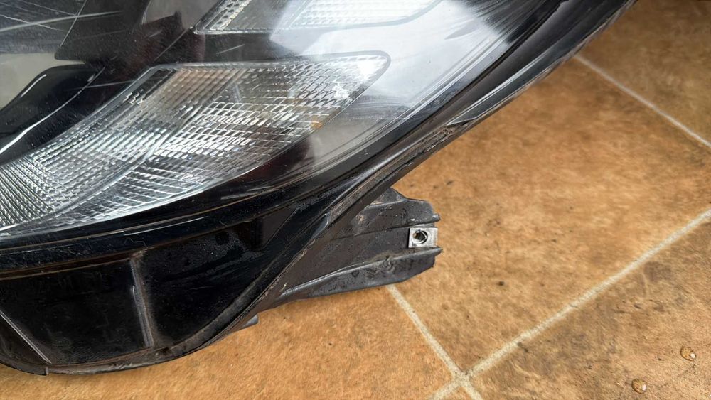 Far stanga Opel Corsa E 39108222