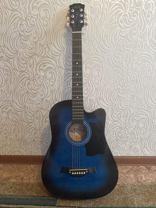 Гитара инструмент