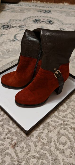 Продам новые сапоги